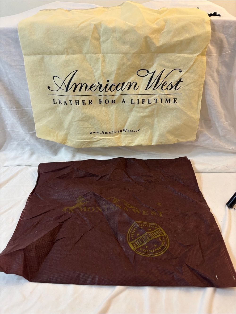 Two. Dust storage covers bags American West and Montana West